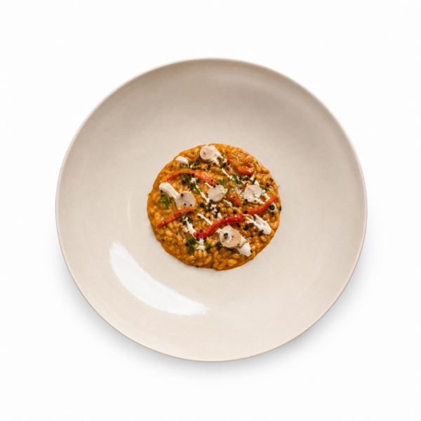 Risotto with pepperoni, goat's cheese foam, lampaschioni and thyme oil