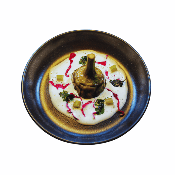 Artichoke braised on goat's cream cheese fondue, parsley oil and red kimchi