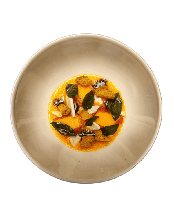 Insalata di melone con feta, basilico, menta e aceto balsamico invecchiato