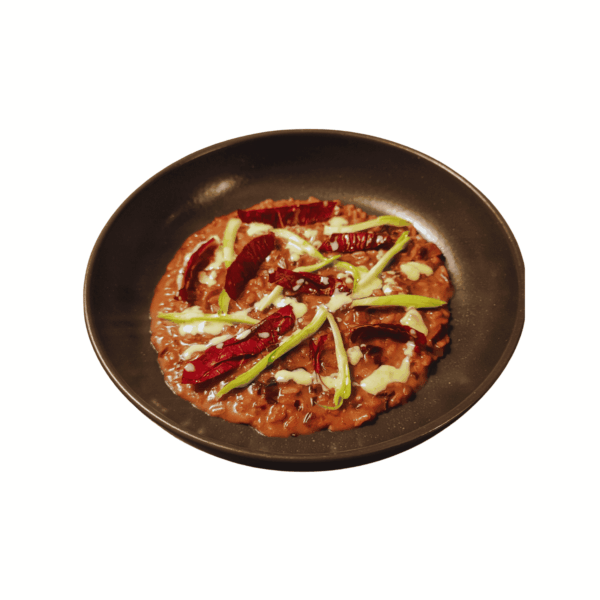 Risotto with Lagrein wine, radicchio, puntarelle, and fresh cheese foam