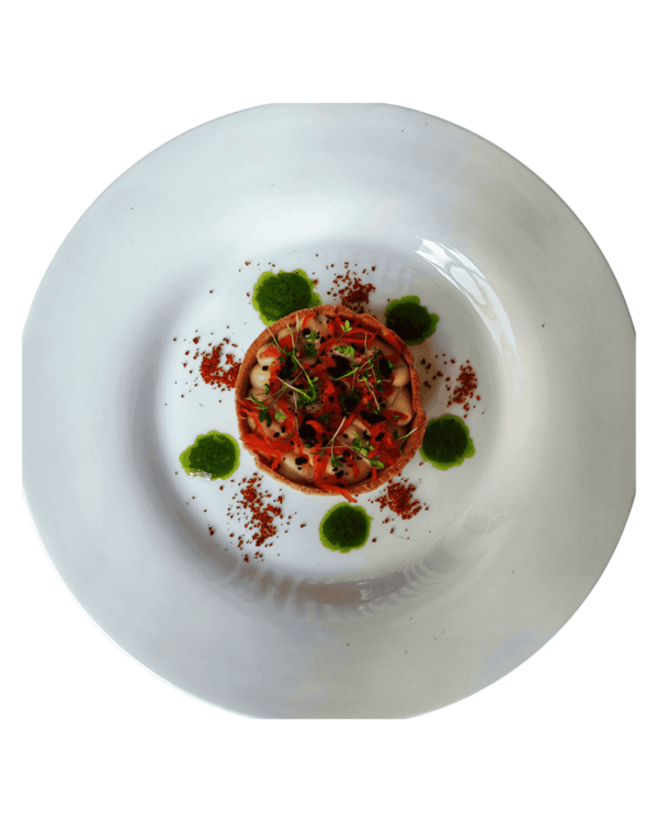 Buckwheat tart with Jerusalem artichoke and celeriac cream, red kimchi, and herb oil (vegan)