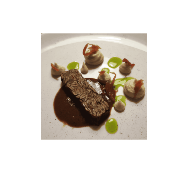 Homemade tempeh, vegan gravy, celery purée, and fermented red cabbage (vegan)