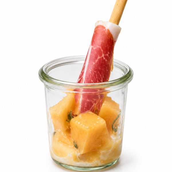 Melon salad with basil, mint, feta and grissino with raw ham S.Daniele