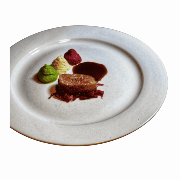 Duck breast with orange jus, three kinds of puree and glazed chestnuts
