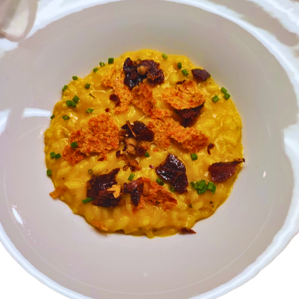 Risotto with pumpkin, rosemary, glazed chestnuts and chips of cured beef