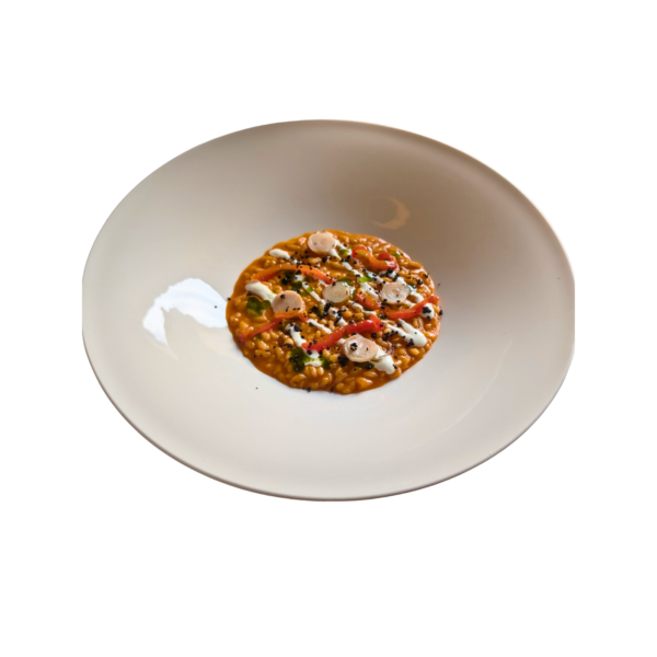 Risotto with pepperoni, goat's cheese foam, lampaschioni and thyme oil