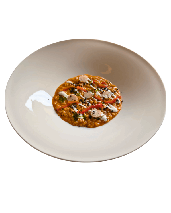 Risotto con salame piccante, spuma di capra, lampascioni e olio al timo