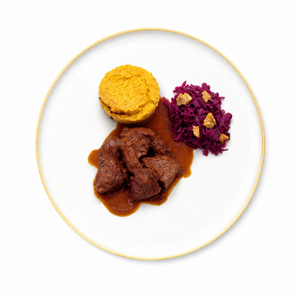 Venison goulash with polenta flan, red cabbage and chestnuts