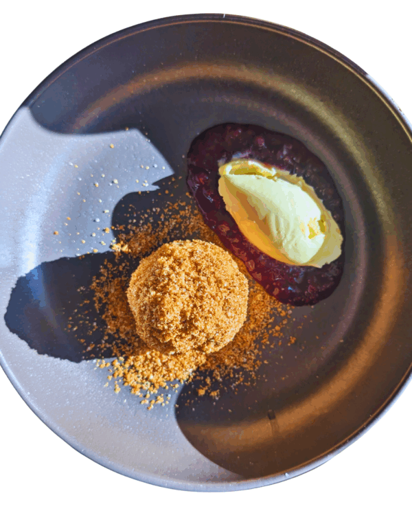 Potted nougat dumplings with forest fruit ragout and homemade vanilla ice cream