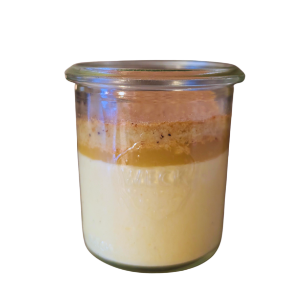 "Muass" in a glass with apple cream, vanilla, semolina cake, and powdered "Scharen"