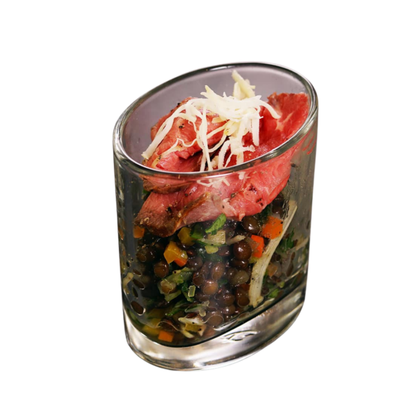 Roast beef Carpaccio on Beluga lentil salad with vegetables and Puntarelle