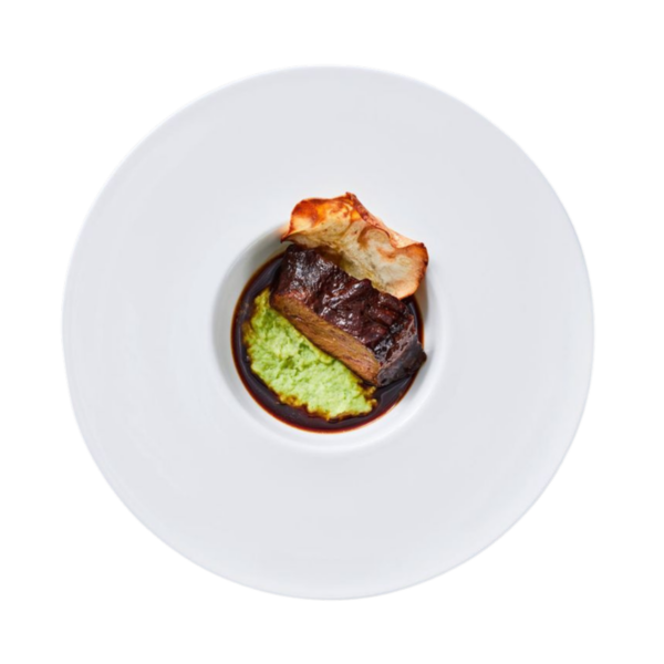 Beef cheek braised in Lagrein sauce with pea purée and glazed carrots
