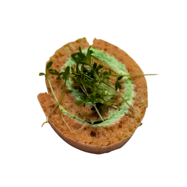 Beetroot rolls with creamy cheese, herbs, and cress